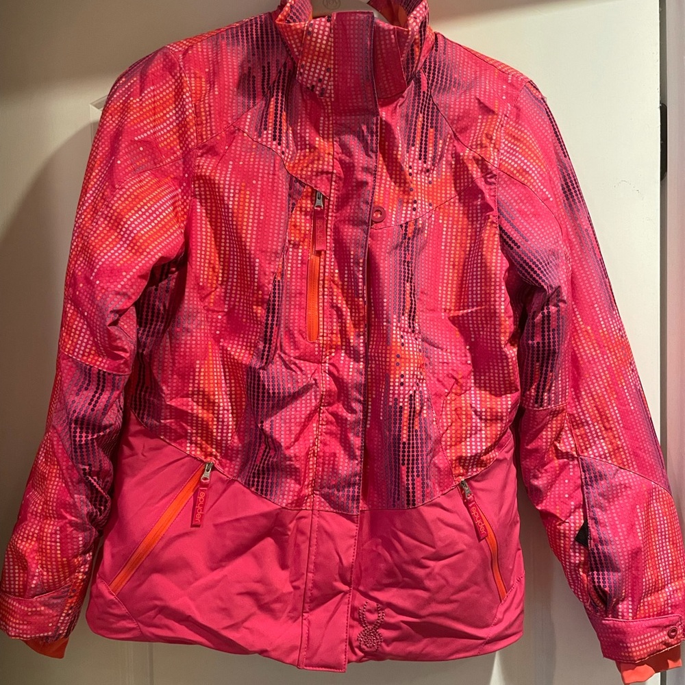Spyder Girls Ski Jacket in excellent condition. Lots of zipper pockets.